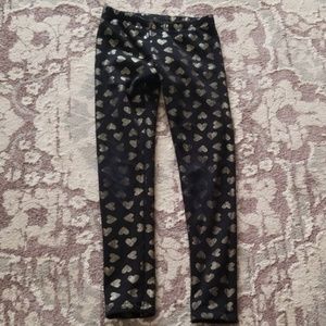 Fleece leggings with gold heart print